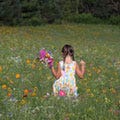 Young girl in wildflower meadow